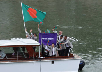 PARIS, FRANCE - JULY 26: Team Bangladesh travel down the River Seine during the opening ceremony of the Olympic Games Paris 2024 on July 26, 2024 in Paris, France. (Photo by Arturo Holmes/Getty Images)