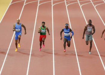 BUDAPEST, HUNGARY - AUGUST 19: Lamont Marcell Jacobs of Team Italy, Imranur Rahman of Team Bangladesh, Rikkoi Braithwaite of Team British Virgin Islands and Brendon Rodney of Team Canada compete in heat 6 of the Men's 100m during day one of the World Athletics Championships Budapest 2023 at National Athletics Centre on August 19, 2023 in Budapest, Hungary. (Photo by Stephen Pond/Getty Images for World Athletics)