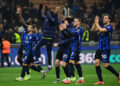 Inter Milan's players celebrate after winning the UEFA Champions League football match between Inter Milan and Leipzig at the San Siro stadium in Milan on November 26, 2024. (Photo by PIERO CRUCIATTI / AFP)