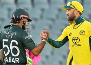 Australia's Glenn Maxwell (R) congratulates Pakistan's Babar Azam after their victory during the one-day international cricket match between Australia and Pakistan at Adelaide Oval in Adelaide on November 8, 2024. (Photo by Brenton EDWARDS / AFP) / -- IMAGE RESTRICTED TO EDITORIAL USE - STRICTLY NO COMMERCIAL USE -- (Photo by BRENTON EDWARDS/AFP via Getty Images)