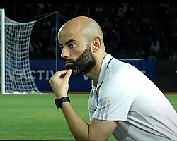 Spanish football coach Javier Fernández Cabrera standing at Bangladesh national team dugout on 15 June, 2023 in a match against Cambodia national team at Phnom Penh National Olympic Stadium, Cambodia.