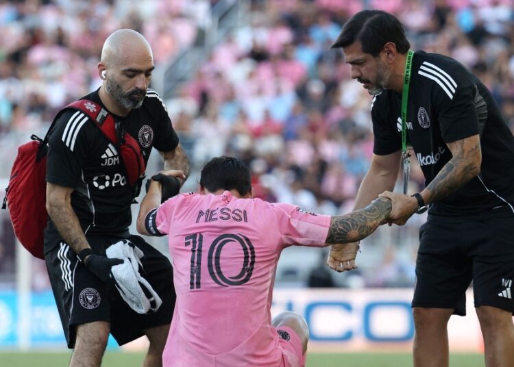 FORT LAUDERDALE, FLORIDA - AUGUST 02: Lionel Messi #10 of Inter Miami CF goes down injured during the Leagues Cup Phase One match between Inter Miami CF and Club Necaxa at Chase Stadium on August 2, 2025 in Fort Lauderdale, Florida.   Leonardo Fernandez/Getty Images/AFP (Photo by Leonardo Fernandez / GETTY IMAGES NORTH AMERICA / Getty Images via AFP)